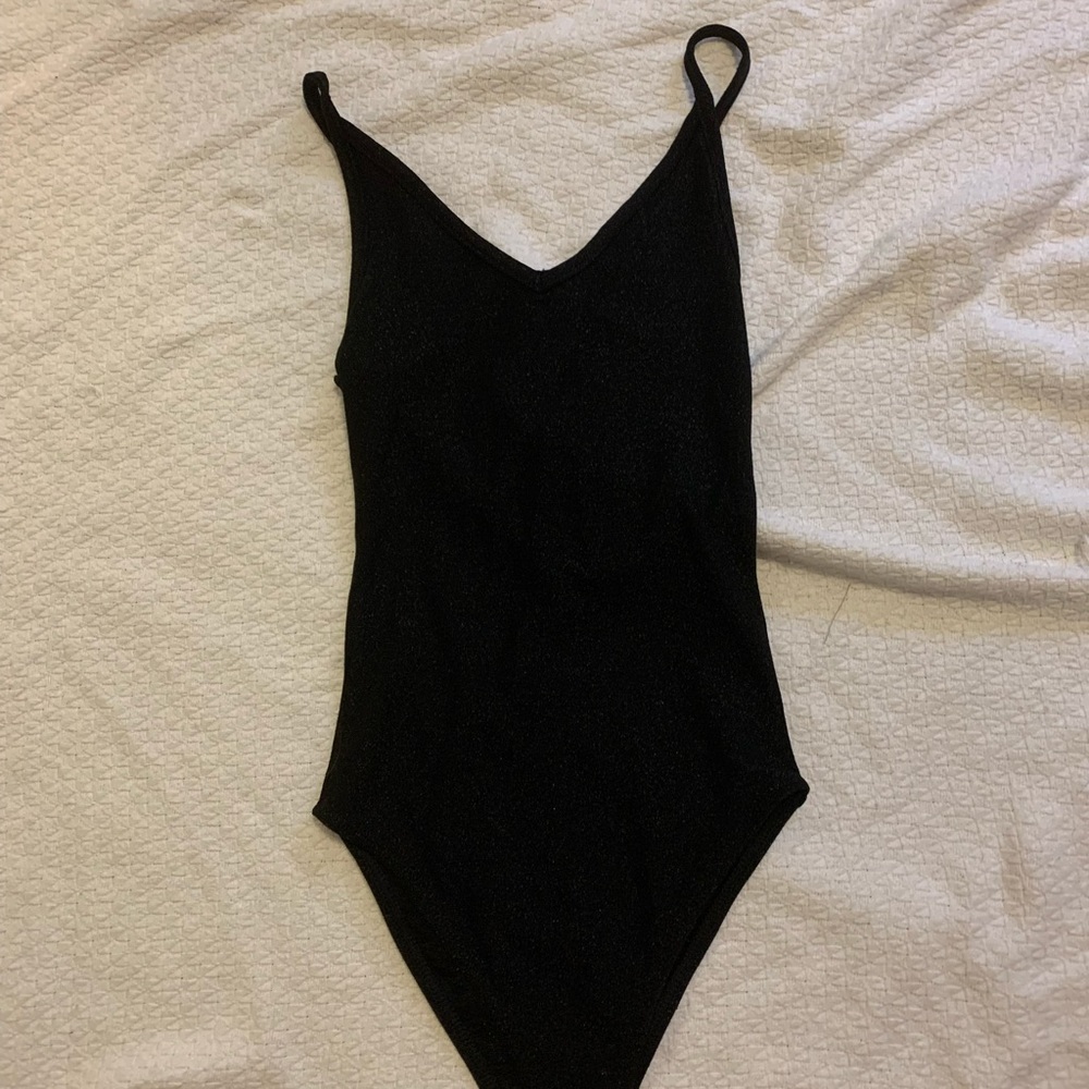 sparkly black body suit